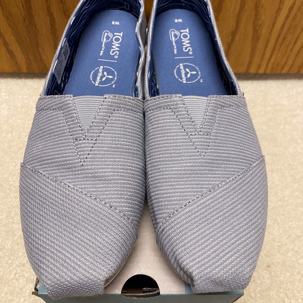 Gray Toms, size 8.